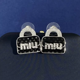 miu miu boucles doreilles pour femme s_12b1550